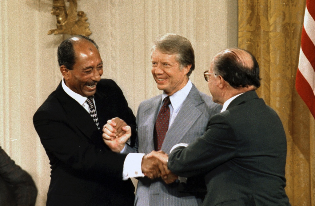 Anwar_Sadat_Jimmy_Carter_Menachem_Begin_sign_Camp_David_Accords-1978.jpg