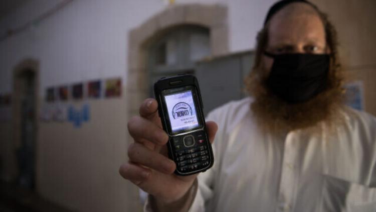 Израильское исследование: «смартфонозависимые» скрипят зубами и теряют сон