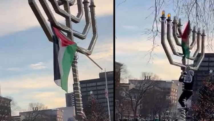 В Коннектикуте антиизраильский демонстрант залез на менору ХАБАДа и водрузил на ней палестинский флаг