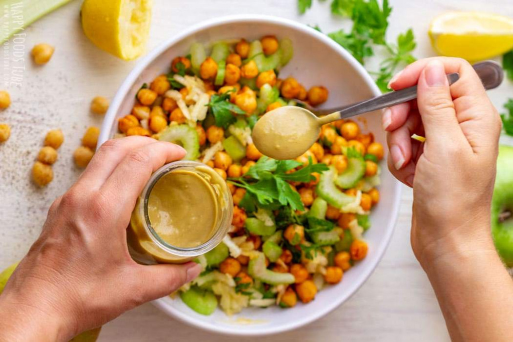 healthy-apple-chickpea-salad-topping-with-dressing-picture.jpg